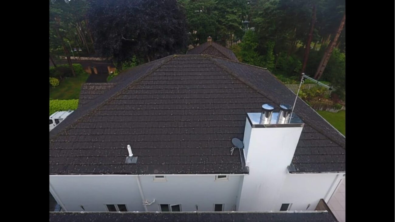 Side on view of moss covered roof in need of restoration