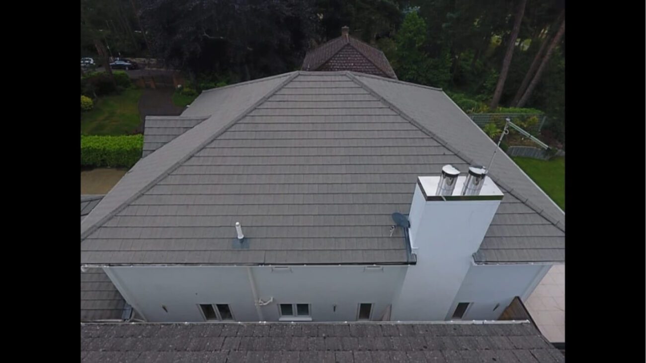 Side on view of residential roof restored from previous filthy state