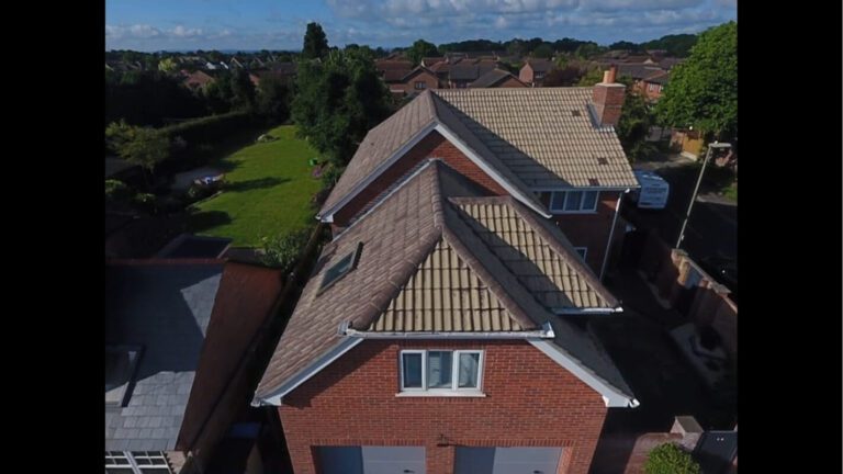 Roof cleaning in progress left side covered in moss right side clean