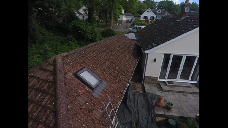 garden room prior to being cleaned dirty with moss on tiles