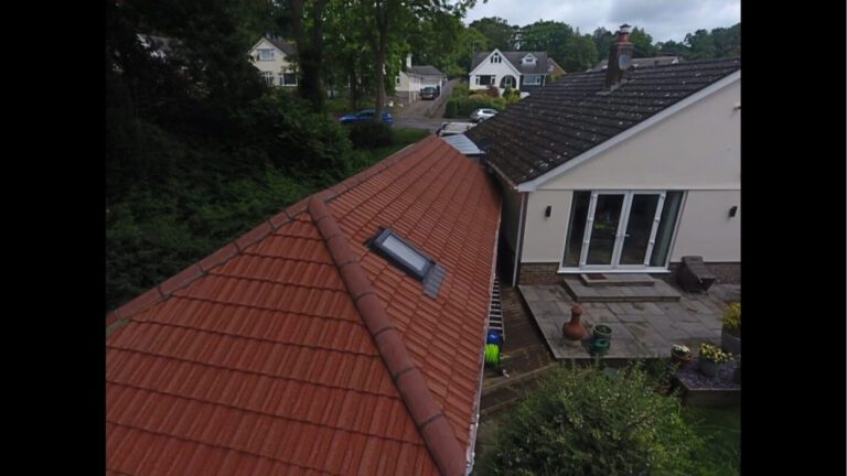 Newly cleaned bright red tiled garden room with roof window