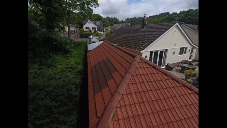 newly cleaned garden building with red tiles on a cloudy day