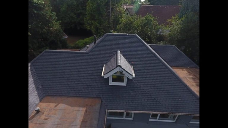 white window on uk home roof that was recently renovated