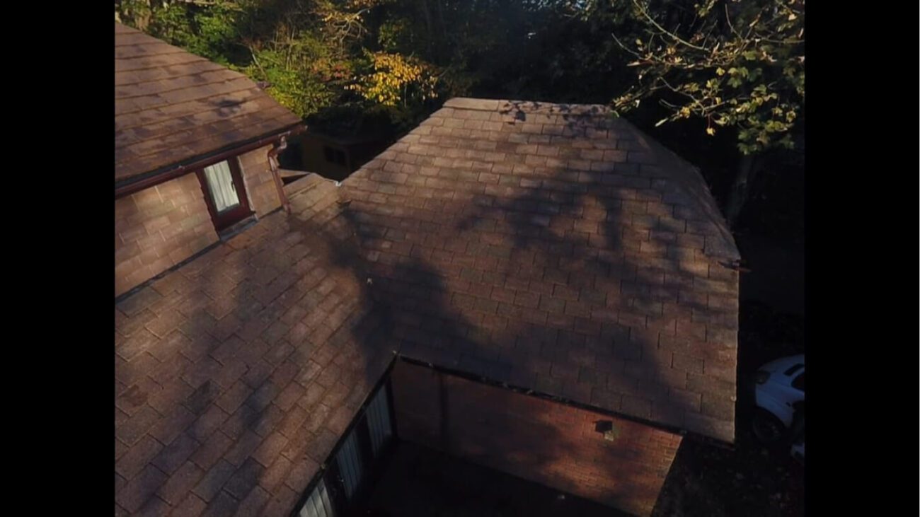 UK brick home post roof clean in the shade of trees