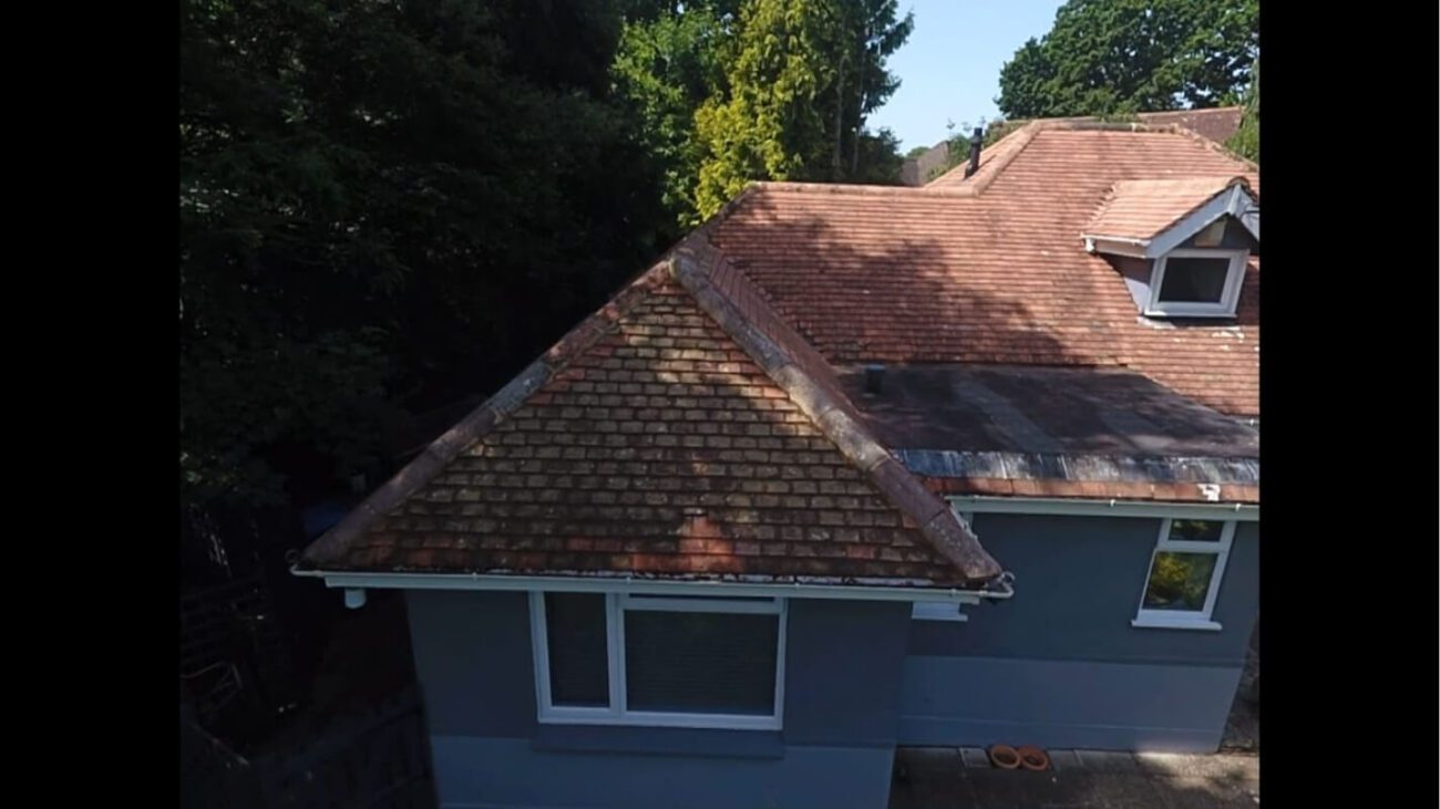 soft washed roof with red tiles drying in the sun Dorset